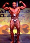 Pat Warner - double biceps at the EFBB Mansfield Classic 2002